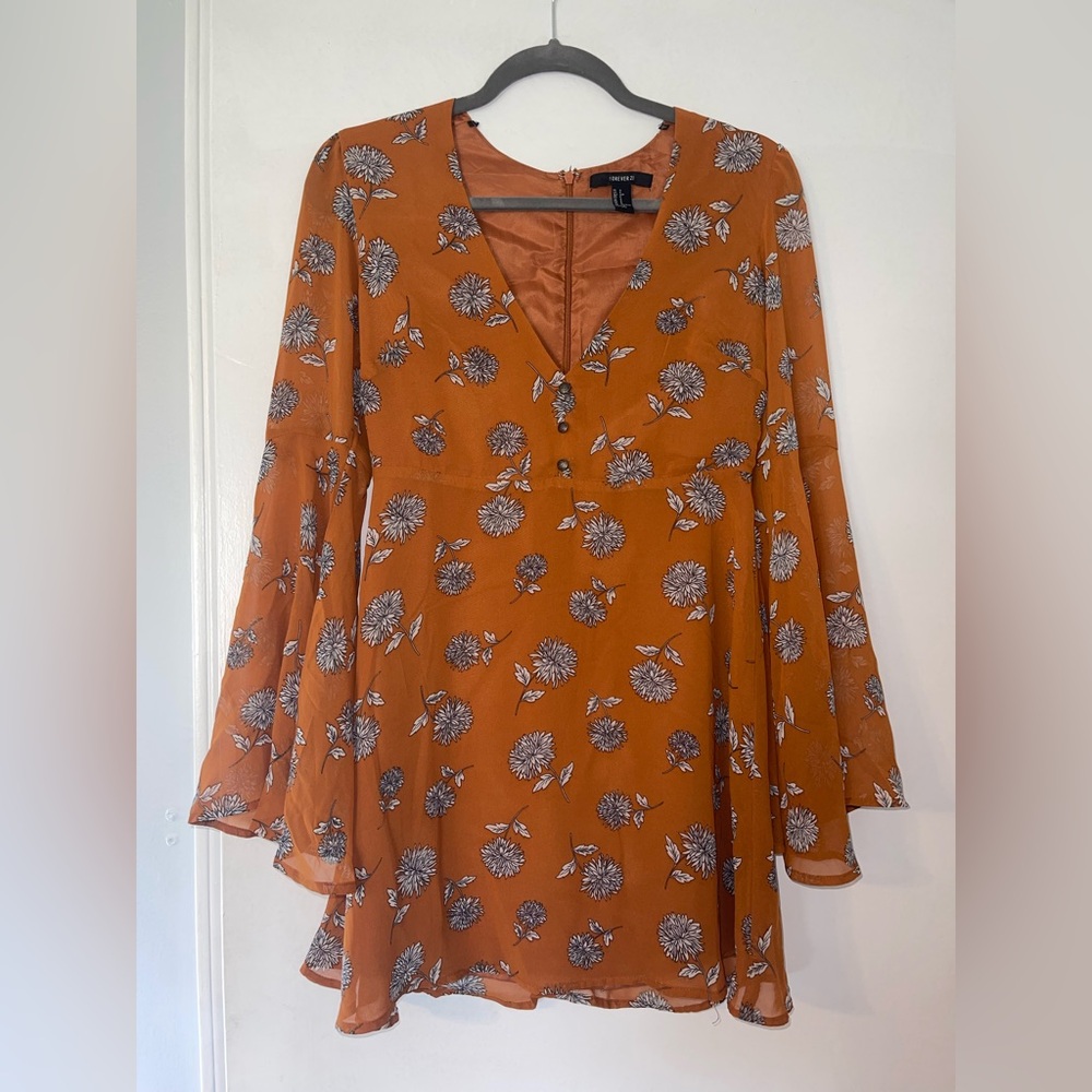 Camel colored, long sleeve dress with flared sleeves